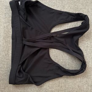 Black strappy Fabletics sports bra